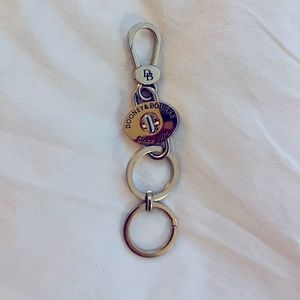 Up for sale is a used genuine Dooney & Bourke valet key ring/fob.